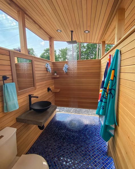 Discover 35 Outdoor Bathroom Ideas for a Blissful Retreat - placeideal.com Outdoor Patio With Bathroom, Outdoor Shower Ideas Private Diy, Outside Bathroom For Pool, Evergreen Backyard, Outdoor Pool Bathroom Ideas, Outdoor Restroom Ideas, Pool House Bathroom Ideas, Rustic Outdoor Shower Ideas, Outdoor Bathroom Ideas