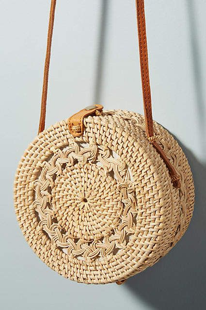 The Summer bag everyone wants this season: Anthropologie Rina Crocheted Crossbody Bag #affiliate Boho Chic Style Outfits, Chic Style Outfits, Round Straw Bag, Rattan Bag, Straw Bags, Basket Bag, Purses Designer, Knitted Bags, Crochet Bags