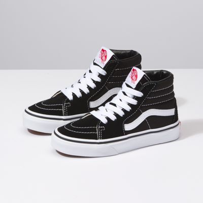 The Sk8-Hi, Vans legendary lace-up high top inspired by the classic Old Skool, has a durable suede and canvas upper, a supportive and padded ankle, and Vans vulcanized signature Waffle Outsole. Black High Top Vans, Nike Kids Shoes, Sk8 Hi Vans, Tenis Vans, Dr Shoes, Vans Kids, Black And White Shoes, Kids Fashion Clothes, High Top Vans