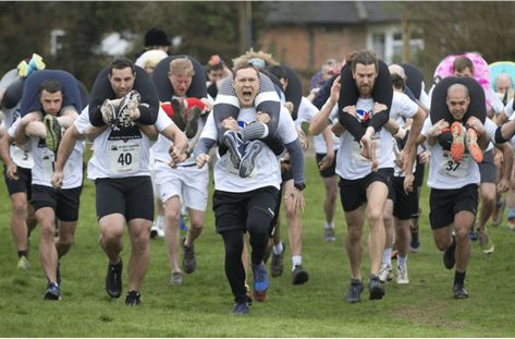 Wife-carrying is an actual competition that originated in Finland and involves male competitors racing while each carrying their wife teammate. #wifecarrying #competition #weird #wtf #funny #lol Wife Carrying, America Images, Minions Humor, Mexican Humor, Sports Images, Popular Sports, All Sports, Mood Humor, Twisted Humor