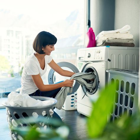 Woman Doing Laundry at Home Shrink Clothes, Washing Machine Repair, Bra Hooks, Delicate Clothes, Doing Laundry, Laundry Service, Dry Cleaners, Dirty Laundry, Household Chores