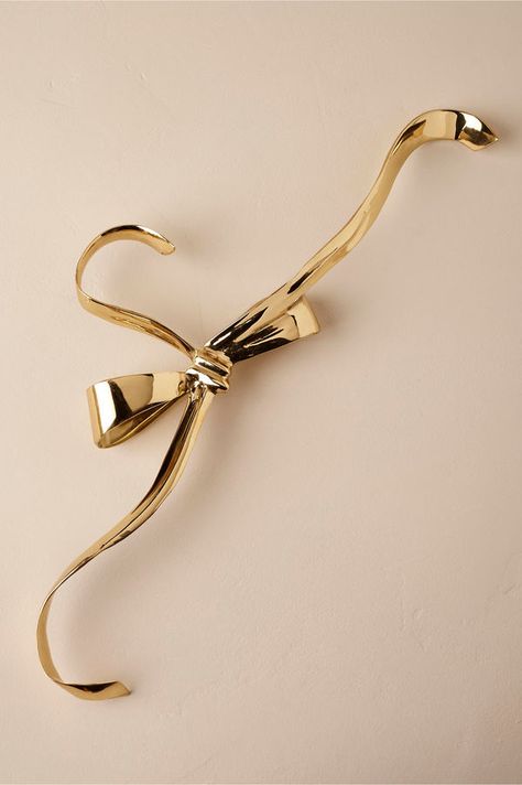 Gilded Bow Hanger. Gold bow hanger. So pretty! (sponsored affiliate link) Bow Wedding Decor, Silk Hangers, Gilded Dress, Gold Bedroom Accessories, Dress Decoration Ideas, Fancy Hangers, Dress On Hanger, Bride Hangers, Hangers For Wedding