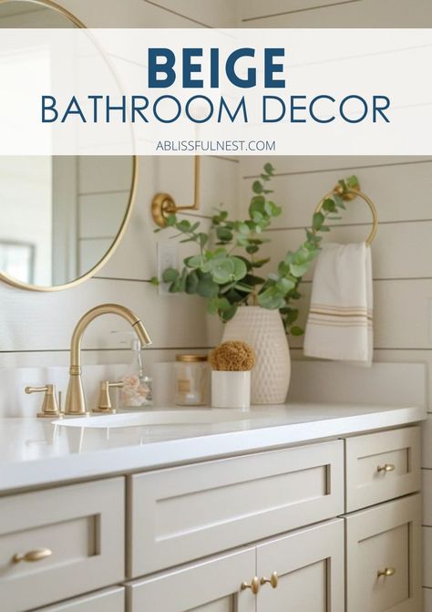 Want to make your bathroom feel more inviting? Beige is the perfect color to bring in that warm, cozy vibe! We’ve got lots of ideas to help you decorate with this beautiful shade, whether it’s through paint, accessories, or textiles. Get ready to love your bathroom even more! #beigebathroom #bathroomgoals #beigebathroomideas Ivory Cabinet Bathroom, Bathroom Decor For White Bathrooms, Beige Bathroom With Wallpaper, Pale Oak Bathroom Vanity, Light Beige Bathroom Ideas, Bathroom Remodel Beige Tile, Tan Cabinets Bathroom, Builder Grade Guest Bathroom Makeover, Tan Vanity Bathroom Ideas