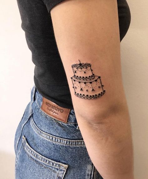 15 Cute Birthday Cake Tattoos Ideas That Are Sentimental & Sweet Tattoo Birthday Cake, 21st Birthday Tattoo Ideas, Baking Tattoo Ideas Unique, Tattoo Cake Ideas, Bday Tattoo Ideas, Folky Tattoos, Strawberry Cake Tattoo, Slice Of Cake Tattoo, Vintage Cake Tattoo