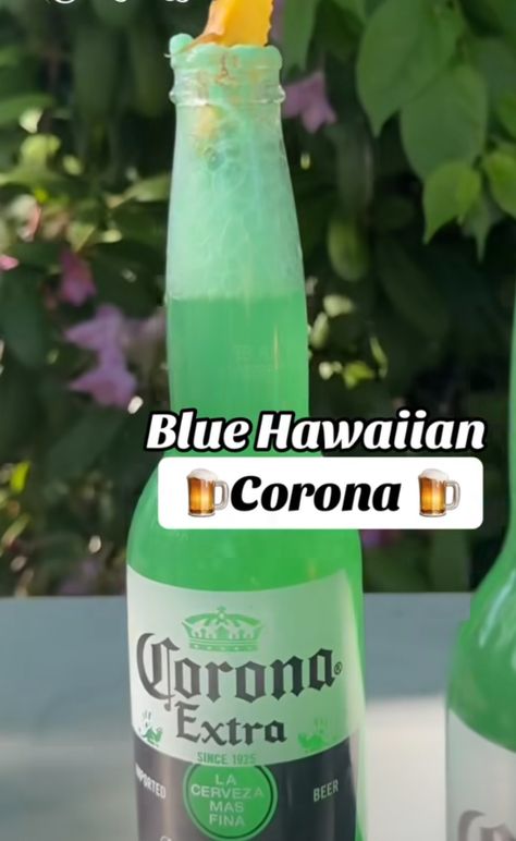 2oz White Rum ~ 2oz Pineapple juice ~ 1oz Blue curaco ~ 1oz cream de coconut blended and then poured into half a bottle of corona Corona Beer Cocktails, Summer Mixed Drinks, Low Calorie Alcoholic Drinks, Mexican Drink Recipes, Different Drinks, Backyard Bbq Party, Christmas Punch Recipes, Cocktail Drinks Alcoholic, Mexican Drinks