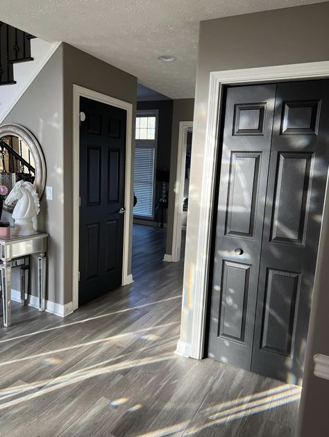 Black Doors Interior Grey Walls, Cream Walls Black Doors, Black Trim Grey Walls, Black Trim White Doors, Grey Walls Black Trim, Black Stairs Painted, Gray Walls With Black Trim, Black Walls Hallway, Grey Walls With Black Trim