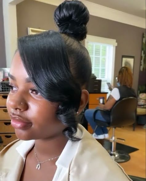 Cute Short Ponytails For Black Women, Bun Ideas Black Women, Ponytail Bun Hairstyles For Black Women, Top Knot Bun With Side Bang, Bun With Bangs Black Women Natural Hair, Top Knot With Bangs Black Women, Bun With Weave Black Women, Ponytail Hairstyles For Black Women Bun, Weave Bun Hairstyles