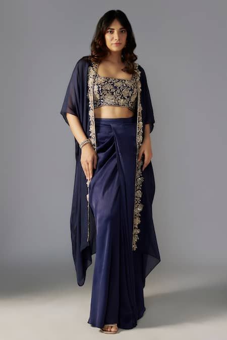 Buy Blue Blouse And Skirt Crepe Satin Embellished Bead Blossom Sequin Draped Set For Women by MAISOLOS Online at Aza Fashions. Saree Cape Blouse, Simple Indo Western Outfits, Drape Skirt Indian, Lehenga Designs Simple, India Dress, Indo Western Dress, Indian Dresses Traditional, Backless Blouse, Indian Gowns Dresses