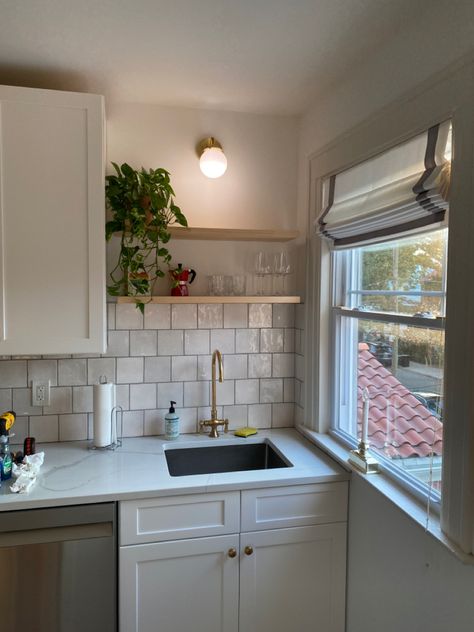 Sink No Window Kitchen, Sink With Shelves Above, Space Above Sink Kitchen No Window, Artwork Above Kitchen Sink, Sink With No Window Ideas, Floating Shelf Above Sink, Kitchen Shelves Above Sink, Floating Shelves Above Sink, Hanging Light Above Kitchen Sink