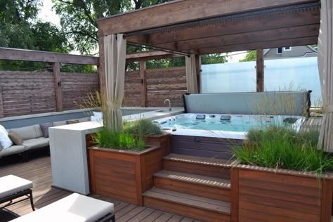 A serene urban getaway, this gorgeous rooftop deck features ipe decking, a built-in hot tub, cedar pergola, outdoor bar and a chic fire pit seating area. Gorgeous Decks, Building Patio, Whirlpool Deck, Hot Tub Deck Design, Hot Tub Area, Hot Tub Landscaping, Hot Tub Designs, Tub Deck, Hot Tub Patio