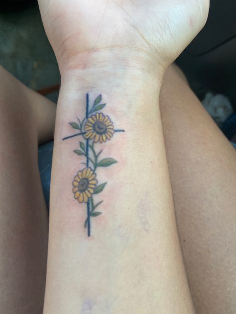 Meaningful Sunflower Tattoos For Women, Christian Sunflower Tattoo, Faith Sunflower Tattoo, Cross And Sunflower Tattoos For Women, Small Sunflower Hand Tattoo, Meaningful Sunflower Tattoo, Cross And Sunflower Tattoo, Sophisticated Tattoos For Women, Country Tattoo Ideas Female