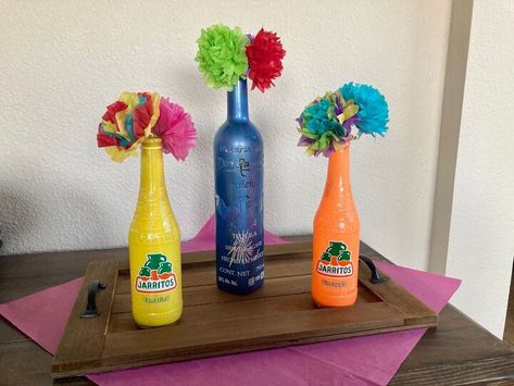 Had to call the family for a last minute Cinco de Mayo celebration party! Figured out the easiest and cheapest way to make a centerpiece was to use whatever I had available on hand. You can also use this centerpiece for a Mexican-theme party, which are very popular here in the Southwest! Mexican Party Table Centerpieces, Fiesta Theme Centerpieces Diy, Modelo Centerpieces Birthday Parties, Mexican Jarritos Centerpieces, Diy Cantaritos Centerpieces, Cinco De Mayo Centerpiece Ideas, Fiesta Theme Centerpieces, Mexican Party Centerpiece Ideas, Fiesta Centerpieces Mexican