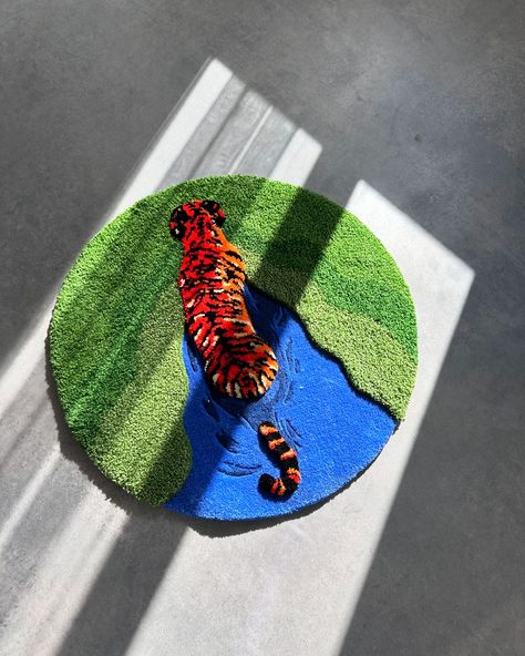 Tiger in the pond 🍃🐅 Our own design with 3 kings of pile ✂️ Available for purchase 🛒 link in bio . . #tigertattoo #customrug #homedecor #flooring #rug #nature #tuftedart #ruglife #homedesign #naturelovers #decorating #carpet #tufting #homedecoration #bohodecor #vintagerug #modernrug #tigers #rugshopping #tiger Fun Rugs Animal, Tiger Bathroom Rug, Tiger Rug Tuft, Tigar Rug, Green Rug With Tiger, Funky Rugs, Animal Rug, Rug Inspiration, Fluffy Rug