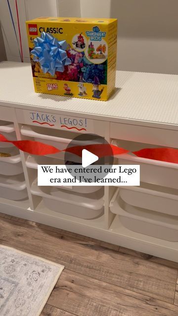 Kaitlyn Rowe on Instagram: "*Check out stories — or comment below — for a link to our favorite Lego finds!  My older two kids have officially entered their Lego era and it’s been so fun. It’s all new to me and I’ve learned a thing or two alongside them these past couple of months.. like I personally had no idea all duplo legos worked with small original lego bases and it’s been so nice having all of our sets in one table for extending play + easy organizing.   Also, peel & stick bases on Amazon were one of my favorite finds yet. They made DIYing an IKEA table into a lego table so simple, plus they make the best vertical walls for displaying creations — my kids are obsessed!   If you have any fun lego hacks/tips, let me know 🤩" Lego Table Storage Ideas, Diy Lego Set Ideas, Lego Trofast Table, Lego Storage Room Ideas, Portable Lego Table, Ikea Hack Lego Storage, Trofast Lego Table Ikea Hacks, Lego Toy Room, Lego Shelving Ideas