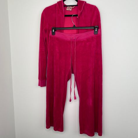 Juicy Couture matching terry cloth tracksuit in hot pink from the 2000s. The bottoms stop at the ankle and has drawstrings. The top has the classic silver J and has a hood. There are two minor stains on the pants. One on the front of the right pant leg and one on the back. In great condition otherwise. Both fit true to size. It does look a tad bit darker in the photos, but I promise it is hot pink. juicycouture hotpink womens track suit y2k 2000 women track jacket vintage Track Suit Y2k, 2000 Women, Red Juicy Couture, Hot Pink Juicy Couture, Juicy Tracksuit, Hot Pink Top, Pink Juicy Couture, Juicy Couture Tracksuit, Juicy Couture Jacket