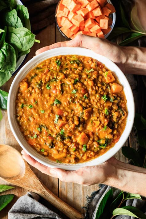 Moroccan lentil stew is a gluten free dinner that's super healthy! This hearty stew is full of sweet potatoes, lentils, turmeric, and vegetables.  Make this healthy stew in your crock pot or on the stovetop and get your clean eating goals back on track fast. Healthy Fall Soup Recipes, Easy Fall Soup Recipes, Healthy Fall Soups, Healthyish Recipes, Lentil Burger, Moroccan Lentil Soup, Moroccan Lentil, Comfort Food Soup, Lentil Stew Recipes