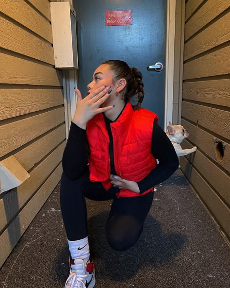 Red Gilet Outfit Women, Red Vest Outfits Aesthetic, Red Puffy Vest Outfit, Red Puffy Jacket Outfit, Black And Red Jordan 1s Outfit, Red Puffer Jacket Outfit Street Styles, Outfit Chaleco Rojo, Red Vest Outfits For Women, Red Puffer Vest Outfit