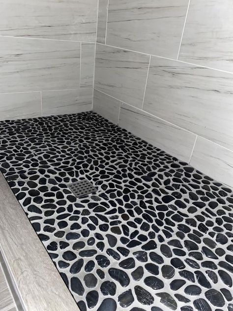 Rain Forest Polished pebble tiles 5-Pack Black 12-in x 12-in Glossy Natural Stone Pebble Floor Tile in the Tile department at Lowes.com Black Pebble Shower Floor, Pebble Floor Tile, Stone Shower Floor, Pebble Stone Flooring, Pebble Shower Floor, White Marble Shower, Pebble Tiles, Dream Home Aesthetic, Rock Shower