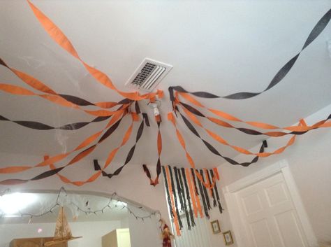 Halloween streamer ceiling decoration Streamer Ceiling, Halloween Ceiling Decorations, Halloween Ceiling, Halloween Streamers, Ceiling Streamers, Halloween Classroom Decorations, Diy Streamers, College Halloween Party, Streamer Decorations