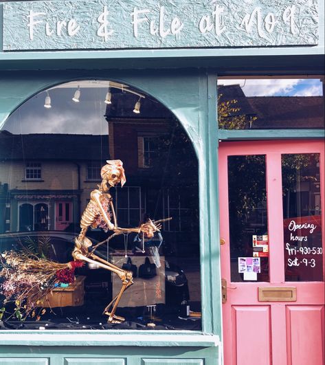 Halloween shop window display. Golden skeleton riding a broom wearing jewellery from Fire & File Metal Design Halloween Shop Window Display Ideas, Halloween Store Window Display, Halloween Window Display Retail, Halloween Shop Window Display, Halloween Store Windows, Halloween Shop Window, Window Displays Ideas, Florist Window Display, Halloween Display Ideas