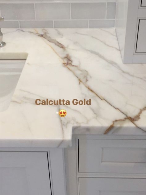 White Kitchen Ideas Countertops, White Marble With Gold Veins Kitchen, Calcutta Gold Granite Countertops, White And Gold Countertops Kitchen, White Gold Countertops Kitchen, Calacata Countertops, Quartz Countertops With Brown Veins, White Countertop With Gold Veins, Quartz With Gold Veining Kitchen