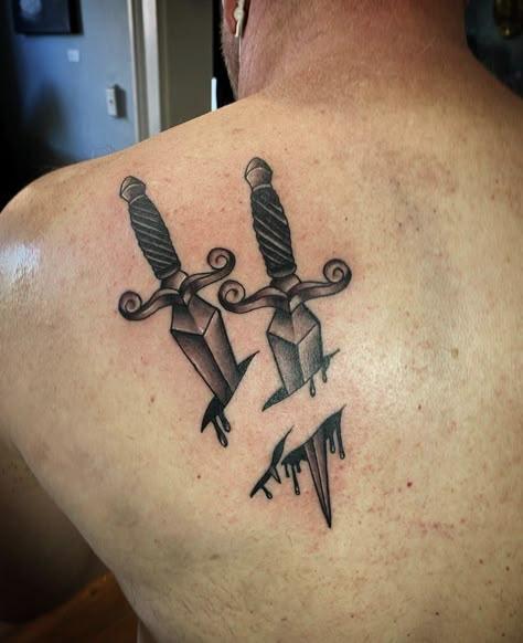 Dagger tattoo by Tevin Knife In The Back Tattoo, Knife In Back Tattoo, Knife Tattoo On Chest, Mens Knife Tattoo, Greek Knife Tattoo, Knife Under Skin Tattoo, Trench Knife Tattoo, Bowie Knife Tattoo Ideas, Hunting Knife Tattoo