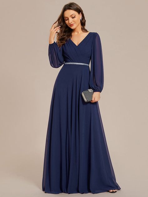 This elegant mother of the bride dress offers timeless sophistication. The pleated double V-neck and long sleeves create a flattering silhouette, while the shiny belt cinches the waist for a stunning hourglass shape. Crafted from chiffon, it drapes beautifully, offering both style and comfort for any formal occasion. Fit: Please refer to size chart. Length: Floor length. Sleeve Style:Long sleeves. Closure: It is concealed a zipper up the back. Undergarments: It is not padded, with lining. Fabric Long Frock Designs, Frock Designs, Dress With Pleats, Plus Size Gowns, Long Frock, Chiffon Evening Dresses, Ever Pretty, Maternity Gowns, Infinity Dress