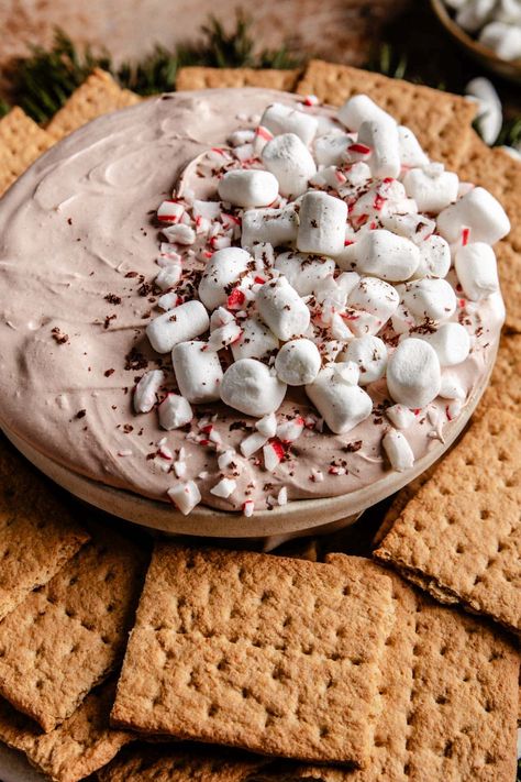 If you’re looking for an easy, delicious, sweet treat to share at holiday parties and gatherings, then this Hot Chocolate Dip is for you! Imagine all the flavors of hot cocoa in a creamy, yummy dip. Serve this sweet dip with your favorite cookies and crackers, fresh fruit, and more! Christmas Cannoli Dip, Desert Board Ideas Christmas, Snacks To Go With Hot Chocolate, Hot Cocoa Dip Charcuterie Board, Dessert Dip For Christmas, Hot Chocolate Cheesecake Dip, Christmas Cool Whip Dip, Christmas Dessert Dips For Parties, Hot Coco Dip Recipe