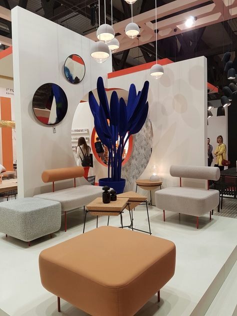 Neutral tones contrast with strong blue plant feature Milan Furniture Fair exhibition stand Furniture Store Design, Exhibition Display Design, Showroom Decor, Exhibition Stall Design, Milan Furniture, Showroom Interior Design, Exhibition Stand Design, Showroom Design, Lounge Design