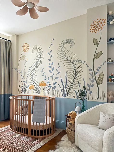 From stripes to a floral wall mural, here are 7 ways to design a blue nursery that stand out from the rest. Apartment 2023, Oval Crib, Fine Paints Of Europe, West Elm Kids, Nursery Mural, Unisex Nursery, Baby Room Inspiration, Nursery Room Inspiration, Blue Nursery