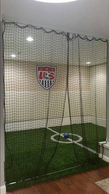 Basement soccer                                                                                                                                                                                 More Soccer Basement Ideas, Indoor Soccer Field In Basement, Indoor Soccer Field In House, Soccer Bedroom Ideas For Boys, Cool Basement Room Ideas, Boys Bedroom Ideas Soccer, Basement Soccer Field, Boy Soccer Room, Boys Soccer Bedroom Ideas