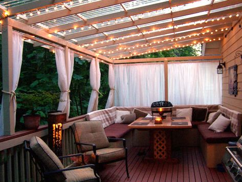 Great deck idea for a little shade and privacy.  Wonder if I could make this work.  From HGTV.com Terrasse Med Tak, Relaxing Outdoor Spaces, Glass Roofing, Outdoor Rope Lights, Deck Roof, Design Per Patio, Porch Curtains, Cheap Patio, Garage Apartments