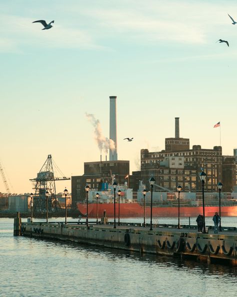 Pier and view of the Domino Sugar Factory, Fells Point, Baltimore, Maryland Baltimore Aesthetic, Fells Point Baltimore, Baltimore Street, Sugar Factory, Baltimore City, Story Aesthetic, Post Grad, Senior Trip, Rooftop Deck