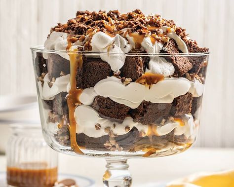 Serve this easy-to-make trifle any time you need a showstopping treat. Turtle Brownie Trifle   Save Recipe Print Makes 1 (4-quart) trifle Ingredients 2 (18.3-ounce) boxes brownie mix* 6 large eggs ½ cup water 1 cup vegetable oil 3 (8-ounce) containers frozen whipped topping, thawed 1 cup chopped toasted pecans, divided 1 cup prepared caramel … Turtle Brownie, Brownie Trifle Recipe, Heaven In A Bowl, Trifle Bowl Recipes, Trifle Dessert Recipes, Turtle Brownies, Brownie Trifle, Cheesecake Trifle, Trifle Dish