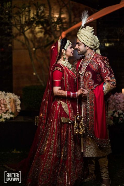 Photo of Traditional bride and groom in maroon outfits Marriage Poses, Poses Romantic, Bride Groom Photoshoot, Bride Groom Poses, Indian Bride Photography Poses, Groom Pose, Indian Wedding Poses, Bride Photos Poses, Groom Photoshoot