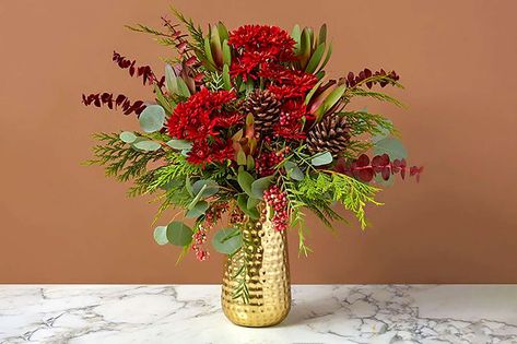 If you’re looking to impress your holiday hosts this season with something special, check out these farm-fresh floral arrangements from Bouqs flowers. All bouquets are $20 off for Black Friday and make beautiful thank you gifts. Christmas Fresh Floral Arrangements, Poinsettia Floral Arrangements, Candle Floral Arrangements, Holiday Flower Arrangements Christmas, Christmas Centerpieces Floral, December Floral Arrangements, Boho Christmas Flower Arrangements, Christmas Bud Vases, New Years Flower Arrangements