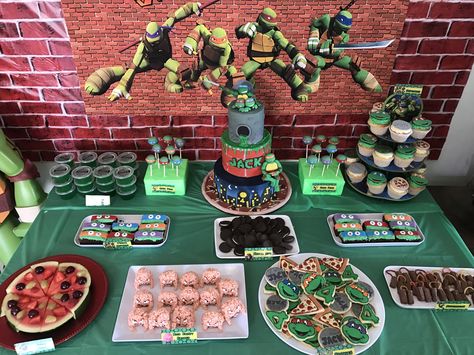 Teenage Mutant Ninja Turtles party food table. Desserts table Ninja Turtle Desserts, Turtle Dessert, Tmnt Birthday, Turtle Birthday, Ninja Turtle Party, Ninja Turtle Birthday, Birthday Desserts, Food Table, Teenage Mutant Ninja Turtles