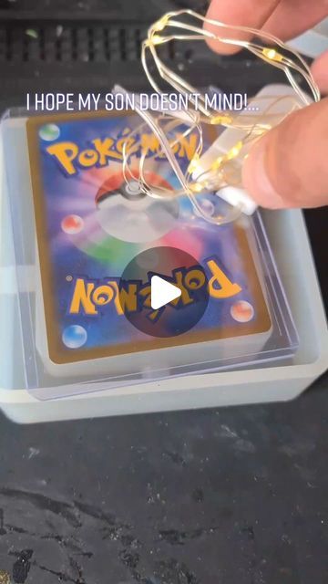 Daniel Cooper on Instagram: "Blast from the past! Pokemon Card In Resin!  This one ramped up 8.5M views and really, really upset the Pokemon Community!..... and the parents of Pokemon collectors! 😂🤣  This is again, why it is important to read video descriptions and the #'s!  The video was planned and it was not my sons card, the last # I used was #it'sajoke but the viewers didn't see it, they just saw what I wanted them to see!  😂😂😂  Resin art, resin, pokemon, pokemon collector, pokemon cards, resin artist, joke  #resinart #resin #pokemon" Pokemon Box Diy, Resin Pokemon Card, What To Do With Extra Pokemon Cards, Pokemon Card Display Diy, Things To Do With Pokemon Cards, Crafts With Pokemon Cards, Pokemon Card Art Ideas, Upcycle Pokemon Cards, Pokemon Arts And Crafts