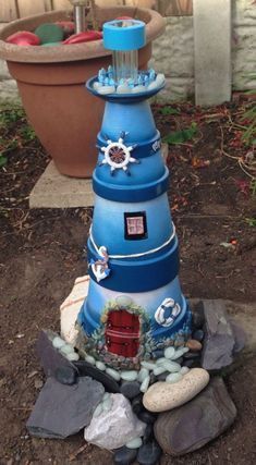 Diy Lighthouse, Clay Pot Lighthouse, Lighthouse Crafts, Theme Garden, Solar Light Crafts, Clay Pot Projects, Flower Pot People, Clay Pot People, Terra Cotta Pot Crafts