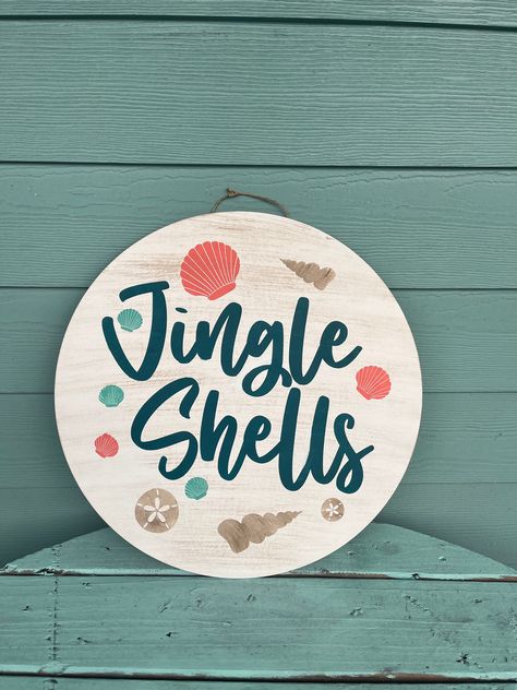 Add the perfect playful touch to your holiday decor with this Jingle Shells ROUND design! Not only will it get your guests in the Christmas spirit, but it's the ideal way to bring a beachy, coastal touch to your home without the need for any snow! So, go ahead and jam to the jingle without leaving the comfort of your own home! Beach Themed Christmas Party, Christmas Coastal Decor, Beach Christmas Ideas, Ocean Christmas Decor, Diy Coastal Christmas Decor, Christmas By The Sea, Tropical Christmas Decor, Christmas On The Beach, Coastal Christmas Decorations