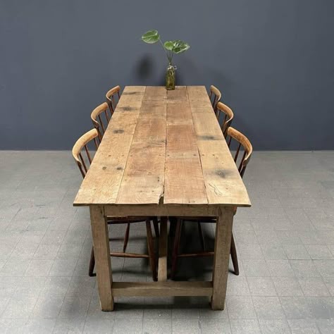 Beautiful rustic oak farmhouse kitchen table from France, around the 1930s. Beautifully made of oak beams and floorboards. The top is mounted to the base with brass and iron flat-head screws. We have cleaned this table, restored it where necessary and kept it as natural as possible. The light rustic oak wood gives a real wabi sabi feeling and the oak planks and beams feel smooth and soft. The legroom between the floor and the bottom edge of the table has a height of 62 cm. A beautiful specimen f Light Brown Farmhouse Table, Farmouse Kitchen Table, Narrow Dinner Table, Rustic Kitchen Table Farmhouse Style, Farm House Dinning Table, Wooden Tables Rustic, Raw Wood Dining Table, Narrow Kitchen Table, Oak Farmhouse Kitchen