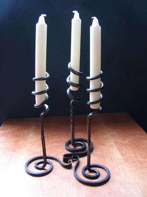 Unique and elegant hand forged candle holders!  Visit stonecountyironworks.com and let us bring your dream to life! Blacksmith Candle Holder, Hand Forged Candle Holder, Wrought Iron Candle Holders, Iron Candle Holders, Blacksmith Tools, Blacksmith Projects, Blacksmith Shop, La Forge, Metal Working Projects