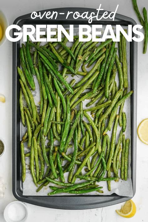 Green Beans are roasted in the oven to savory perfection with olive oil, fresh lemon, and garlic. This quick and easy side dish is perfect all year long. Green Been Oven Recipe, Green Beans Roasted In Oven, Best Oven Roasted Green Beans, Fresh Green Bean Recipes Roasted, Broiled Green Beans, Roast Green Beans Oven, Fresh Green Beans In Oven, Fresh Green Bean Recipes Oven, Oven Green Beans Fresh