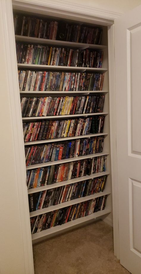 Floating Dvd Shelves, Movie Library Room, Movie Shelf Ideas Dvd Storage, Dvd Storage Ideas Aesthetic, Media Closet Ideas, Dvd Shelf Aesthetic, Dvd Shelf Ideas, Dvd Bookshelf, Dvd Organization Ideas