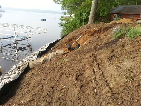 Garden On Steep Slope, Sloped Lakeside Landscaping, Steep Bank Landscaping, Landscape Steep Hillside, Steep Lakeside Landscaping, Steep Slope Backyard Ideas, Side Hill Landscaping Ideas, Landscaping A Steep Slope, Steep Slope Backyard