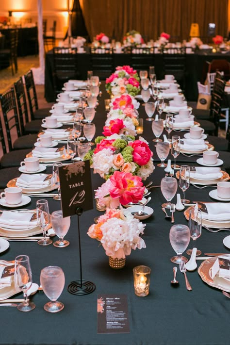 Black And White Wedding Theme With Pop Of Color, Black Tablecloth Bright Flowers, Black And White Wedding With Colored Flowers, Classic Wedding With Pop Of Color, Black Pink Orange Wedding, Black Spring Wedding Color Palettes, Black With Pops Of Color Wedding, Black And White Wedding With Colorful Florals, Black And White Wedding Pop Of Color