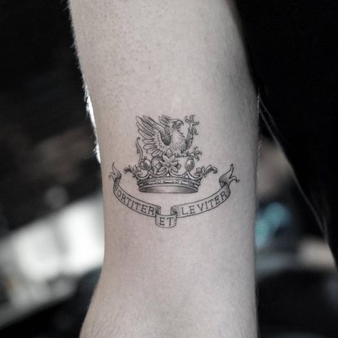 Family crest tattoo on the right bicep. Coat Of Arms Tattoo, Arms Tattoos, Family Crest Tattoo, Small Music Tattoos, Crest Tattoo, Tree Tattoo Men, Leopard Tattoos, Family Tree Tattoo, Wild Tattoo