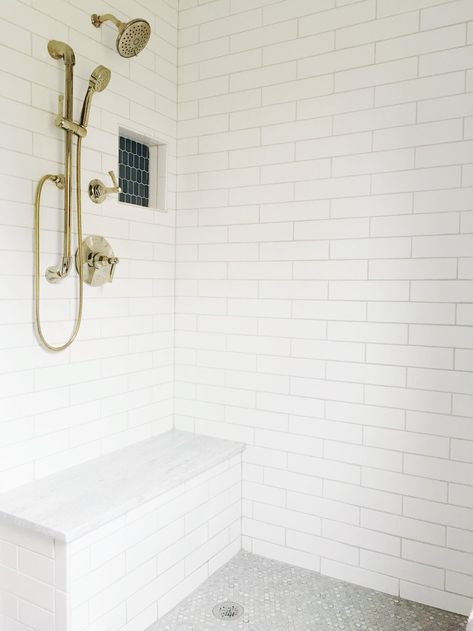 White Subway Tile 3x12 in our Master Bathroom Renovation #subwaytile #masterbathroom #bathroom #interiordesign #showerniche #niche #polishednickel #showerseat #white #granite #pennytile White Tile Bathroom, White Tiled Bathroom, White Subway Tile Bathroom, Subway Tile Showers, Tiled Bathroom, Subway Tiles Bathroom, Bathroom Red, Tiled Shower, Primary Bath