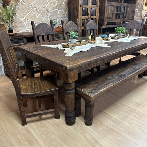 The Legendary all time best selling Ponderosa Dining Set Now in 8' length. 100% Solid Wood Construction, this table is build to last! Finished in a dark wax stain and accented with metal nail heads, The Ponderosa 8' will be a perfect fit for those looking for a large table set in a timeless rustic style. Choose from all 8 chairs or 5 chairs and a bench! Rustic Kitchen Tables, Mexican Home, Rustic Dining Room, Kitchen Tables, Table Sets, Farmhouse Dining Room, Rustic Table, Farmhouse Dining, Rustic Dining