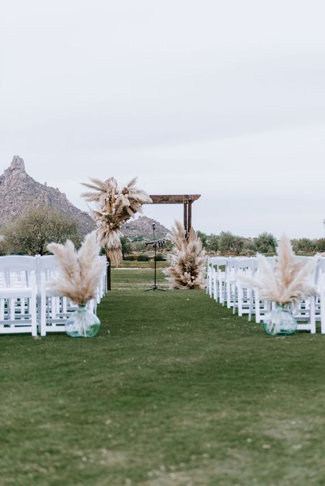 Dry Floral Arrangements Wedding, Boho Wedding Arch Pampas, Boho Aisle Arrangements, Arbour Floral Arrangement, Boho Ceremony Flowers, Boho Wedding Bouquet Cascading, White Bridal Bouquet With Pampas, Pampas Reception Decor, Pampas Alter Decor